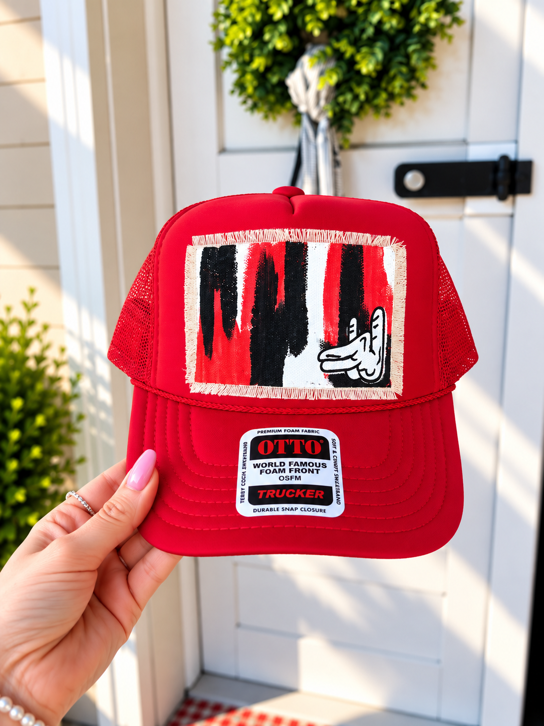RED WOLF FINGERS TRUCKER HAT