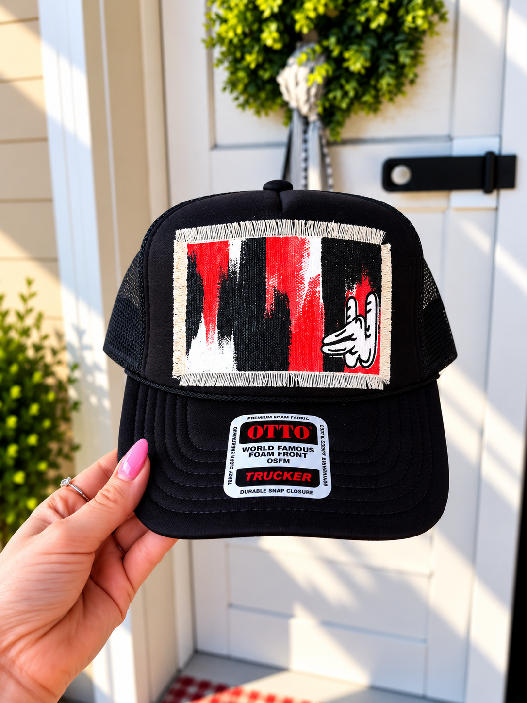 BLACK WOLF FINGERS TRUCKER HAT
