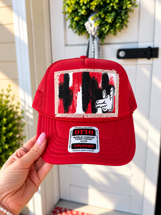 RED WOLF FINGERS TRUCKER HAT