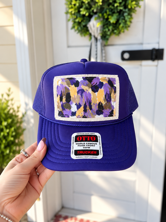 ABSTRACT PURPLE/GOLD TRUCKER HAT