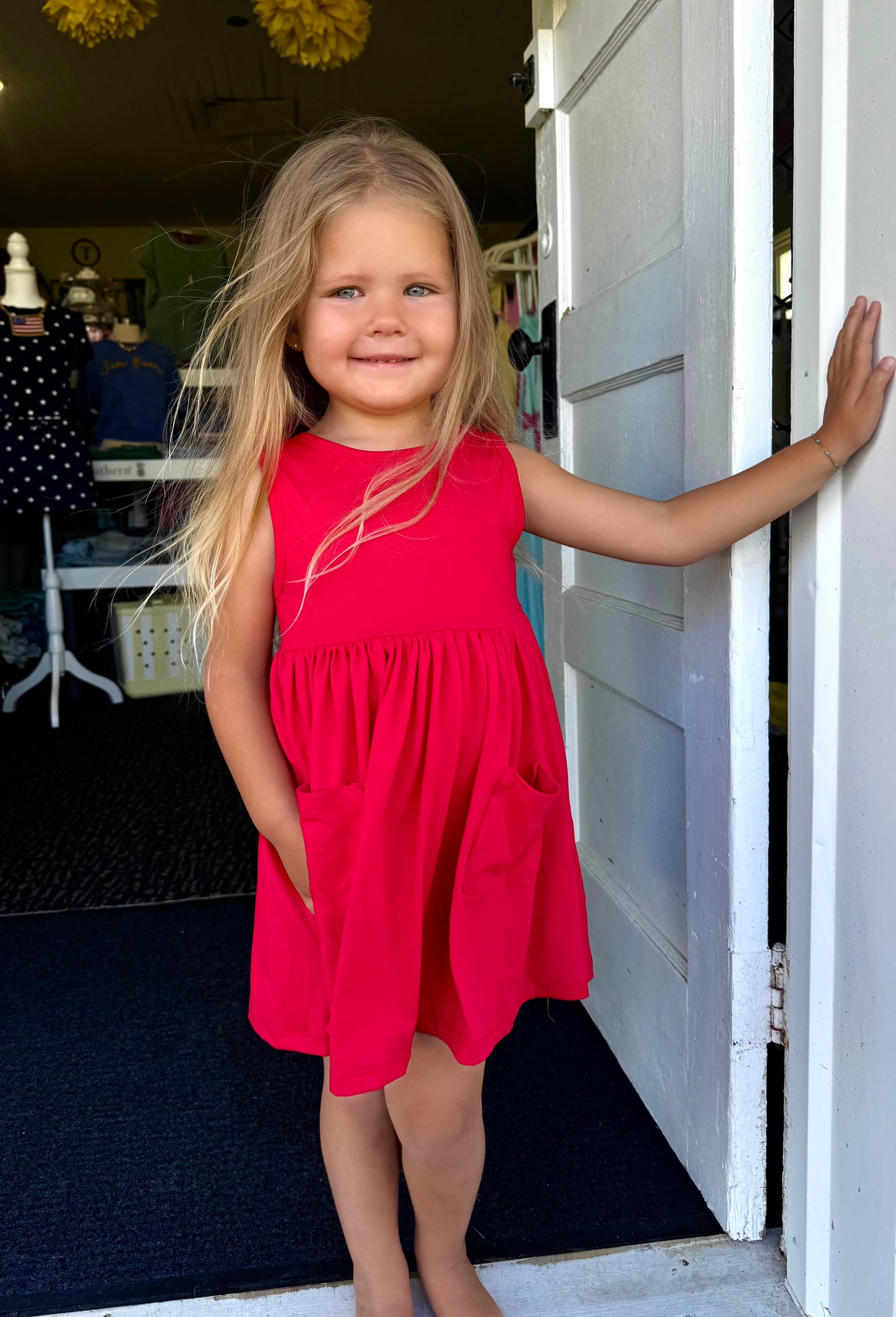 RED POCKET TWIRL DRESS
